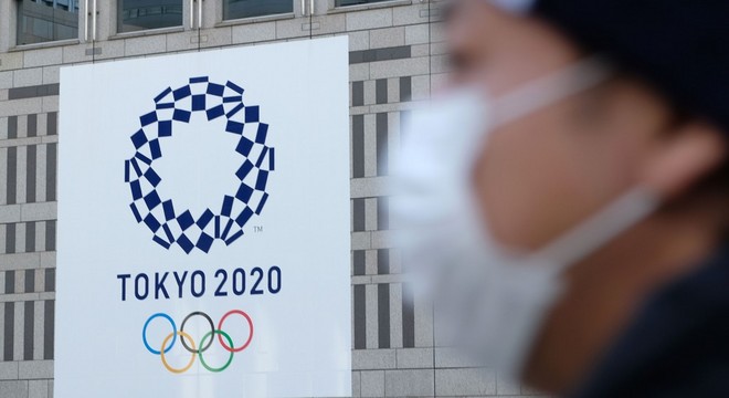为什么日本非要如期举办奥运会不可？